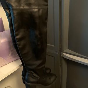 Knee high boots.
